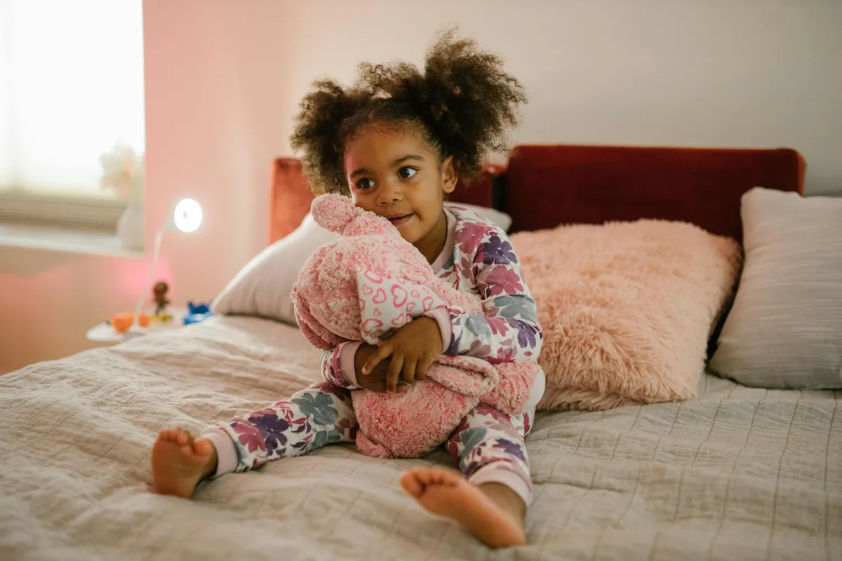 toddler on bed