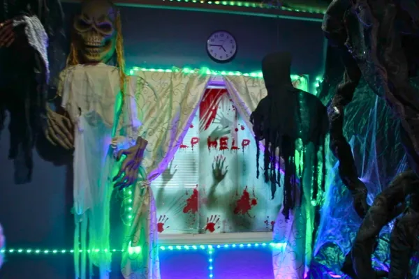 JDS Creative Academy students creating a haunted theater experience, learning lighting, sound, and storytelling skills during Halloween.