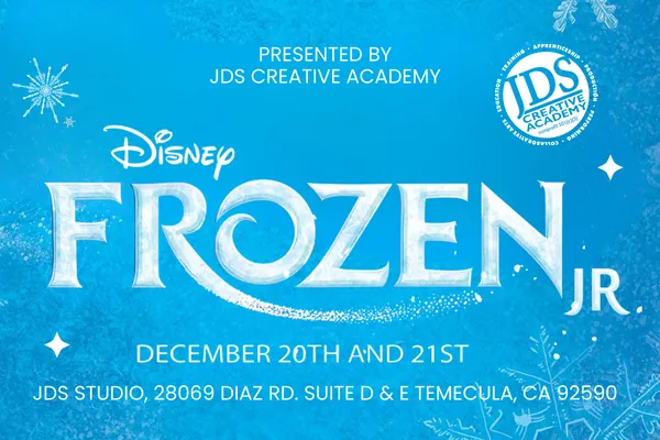 Frozen Jr. cast performing on stage at the JDS Creative Academy Winter Showcase with students in colorful costumes expressing emotion and teamwork