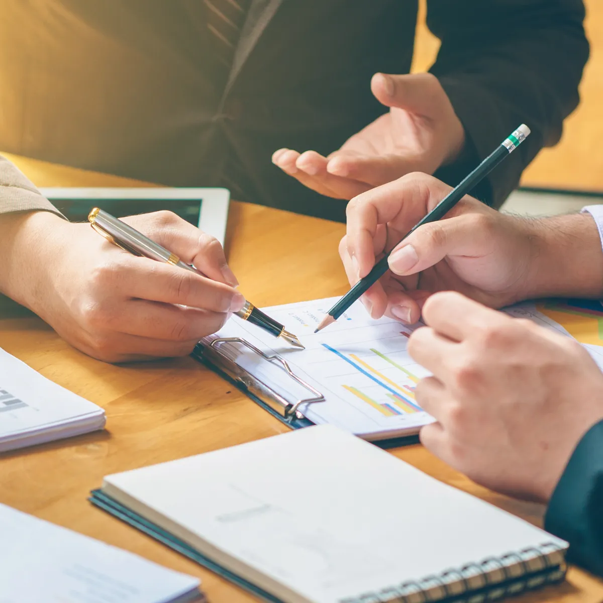 Senior leaders going through a peer calibration symbolising an method to reset imposter syndrome