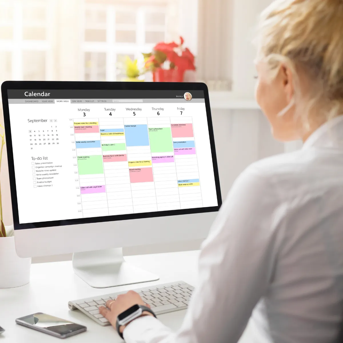 Senior leader at a laptop looking at a calendar trying to clarify next steps