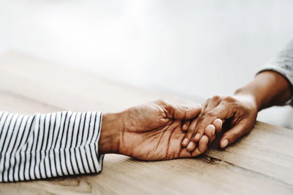 Couple holding hands