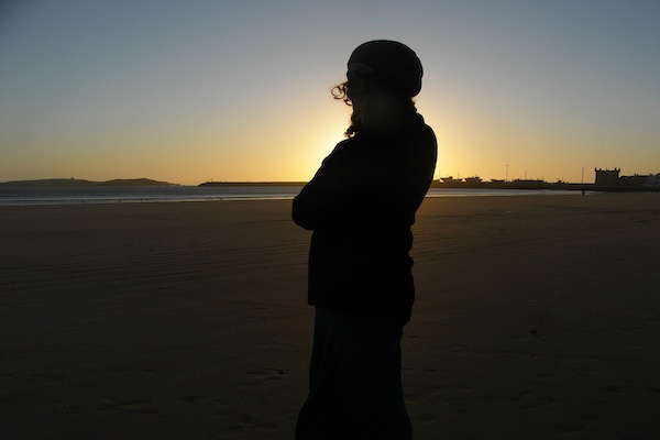 Nicky reflecting with the sunsetting