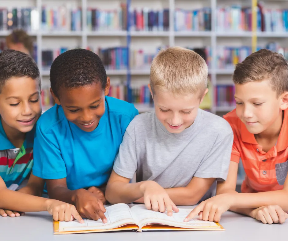 Boys reading a book
