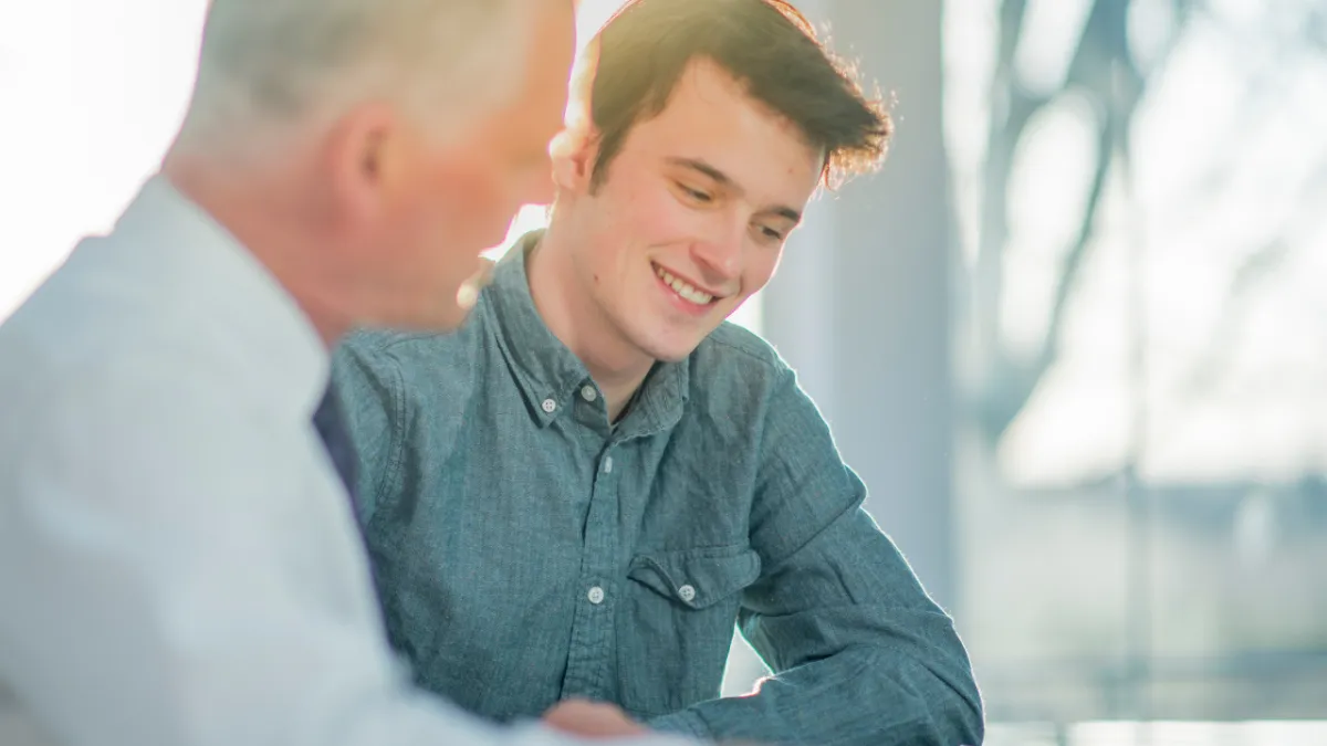 Young adult in their 20s learning and growing - building money skills, career confidence, and freedom with guidance from The Money Guide