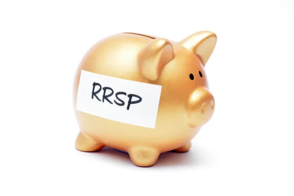 Gold piggy bank that has a note on it that says RRSP