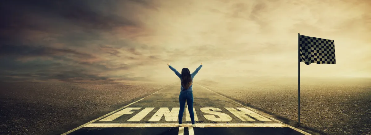 A business owner reaching the finish line - representing the end of the calendar year
