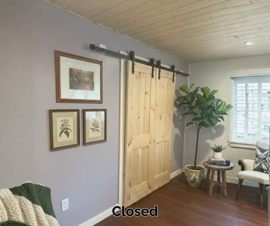 Custom-built solid wood sliding barn doors with metal hardware