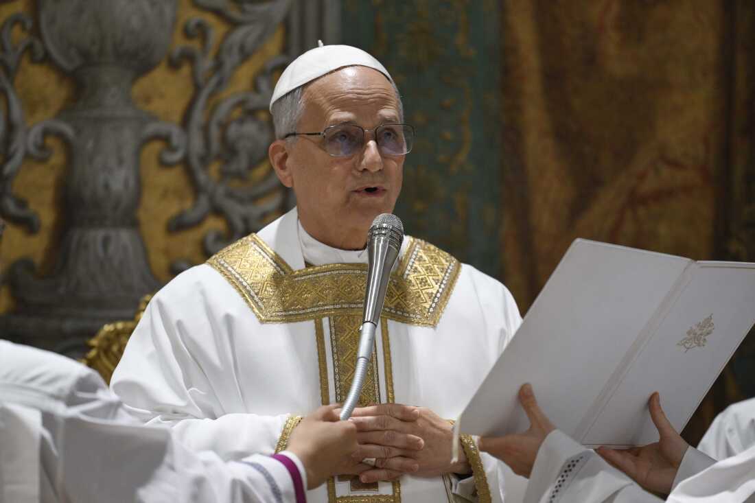 Pope Leo XIV stands at the altar during Mass, lifting incense in prayer, symbolizing the Church’s call for justice, peace, and compassion for the Venezuelan people after political upheava