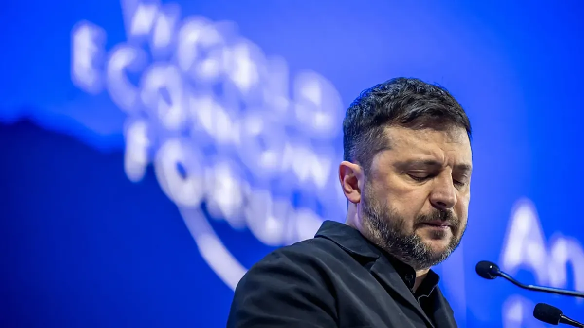 Ukrainian President Volodymyr Zelenskyy speaking forcefully on stage at the World Economic Forum in Davos.