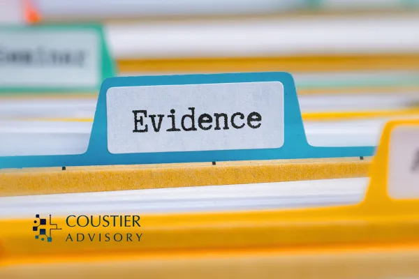 Close-up of a file folder tab labeled “Evidence,” symbolizing the importance of payer dossiers and structured evidence development for MedTech startups, with Coustier Advisory logo.