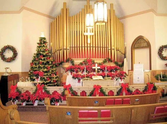 Top Majestic church Christmas background setup with twinkling lights, nativity accents, and festive altar arrangement today.