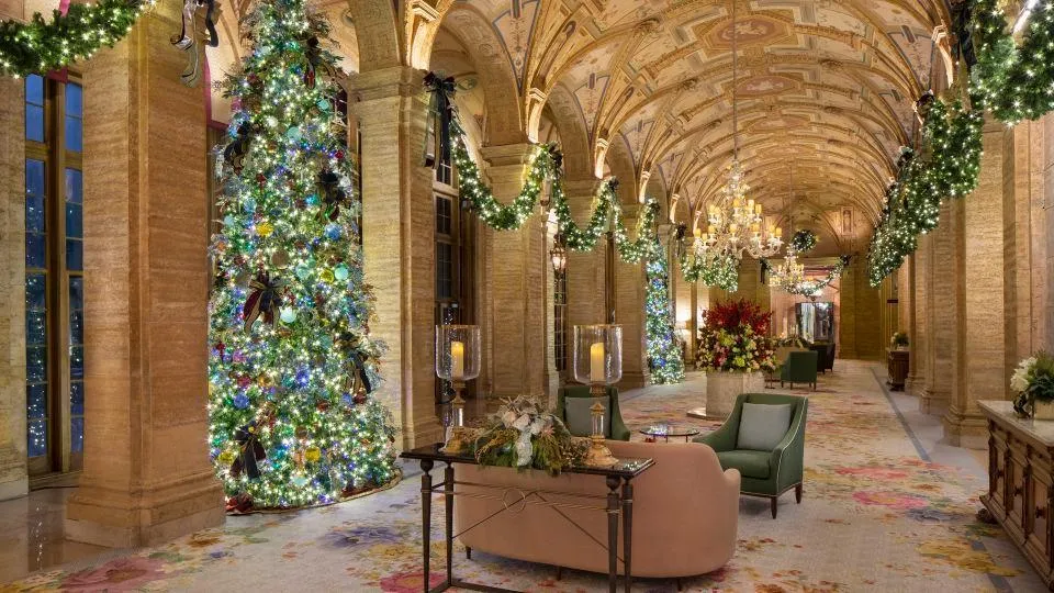 Hotel Christmas lighting designs with twinkling warm bulbs, cascading icicle lights, and radiant festive exterior brilliance.