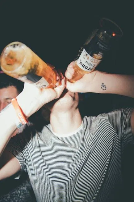 young person drinking 2 bottles at the same time