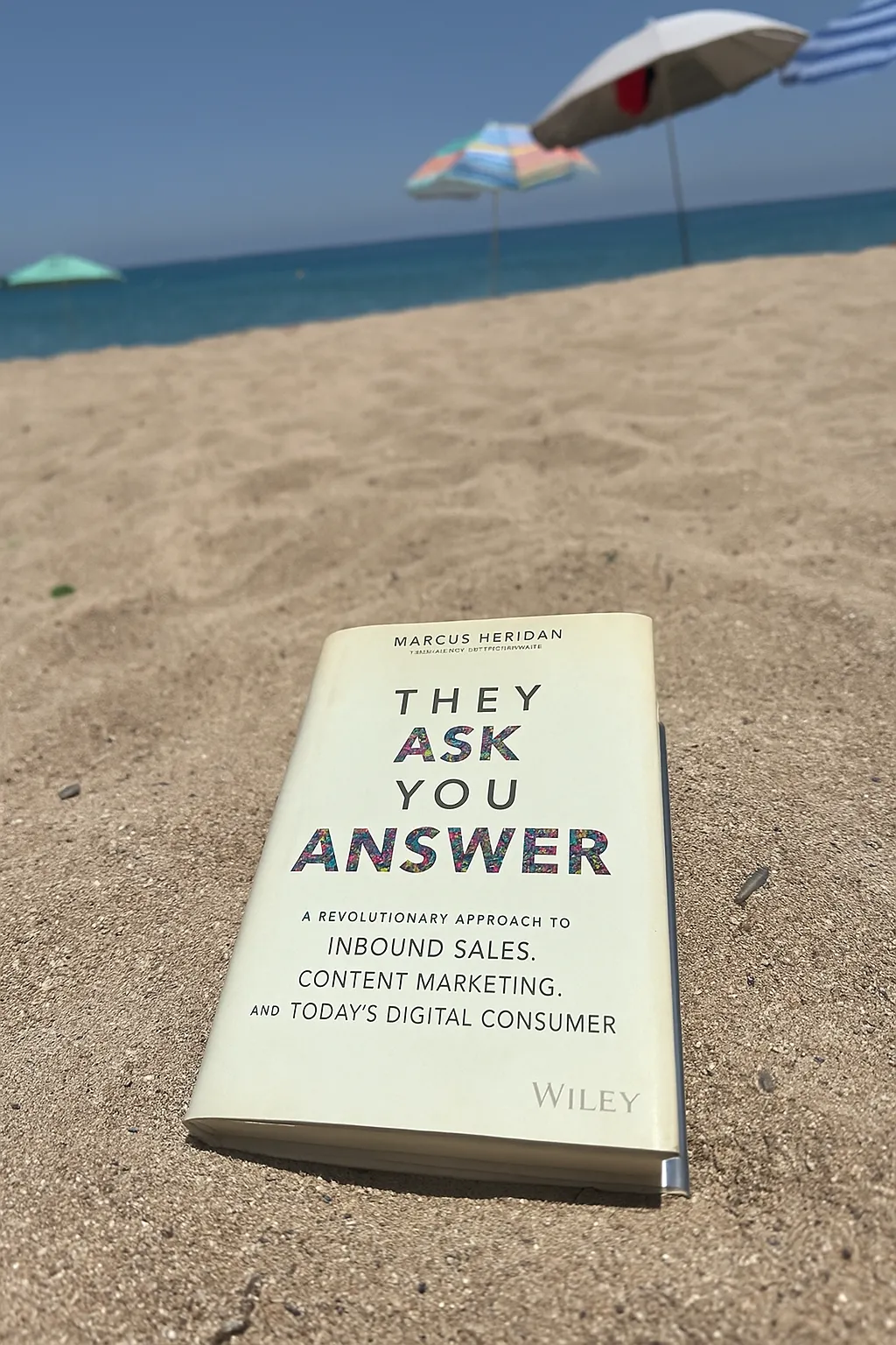 They Aswk, You Answer by Marcus Sheridan on the beach