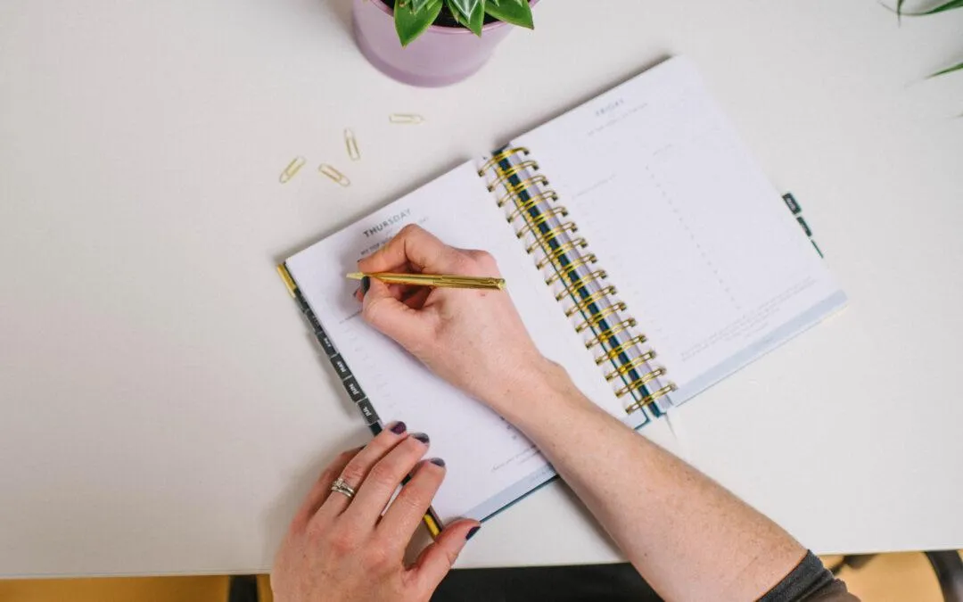 Hand writing in a notebook