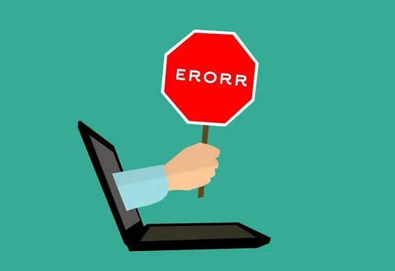 Stop Sign coming out of a laptop