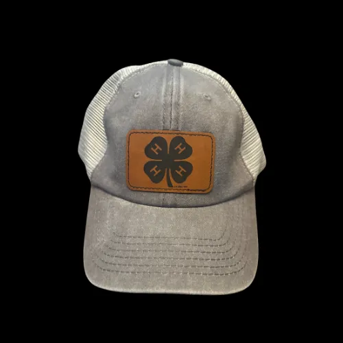 Gray and white hat with the 4-H logo laser engraved on a brown leather patch in the center.