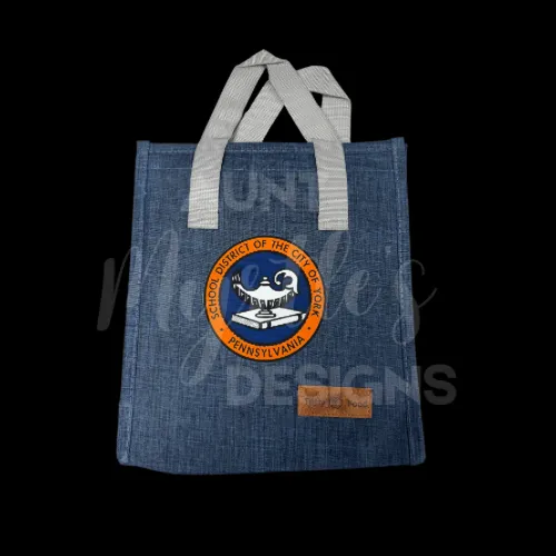 Blue lunch bag branded with the School District of the City of York logo