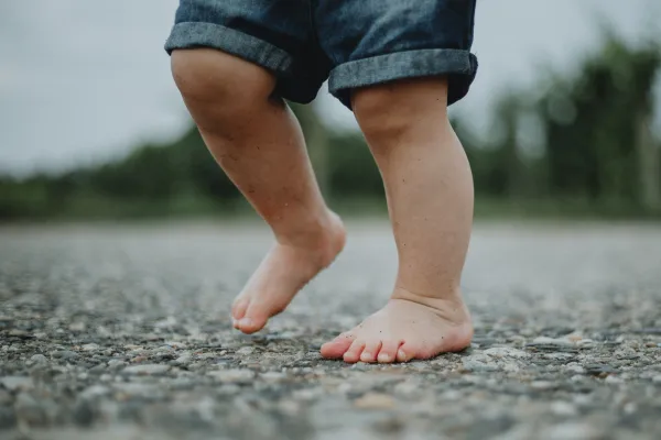 toddlers feet on the ground