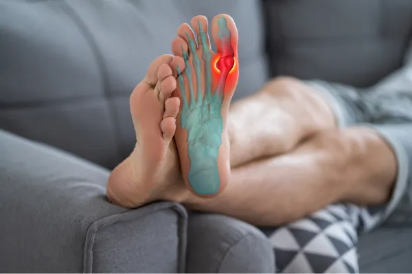 man with foot pain