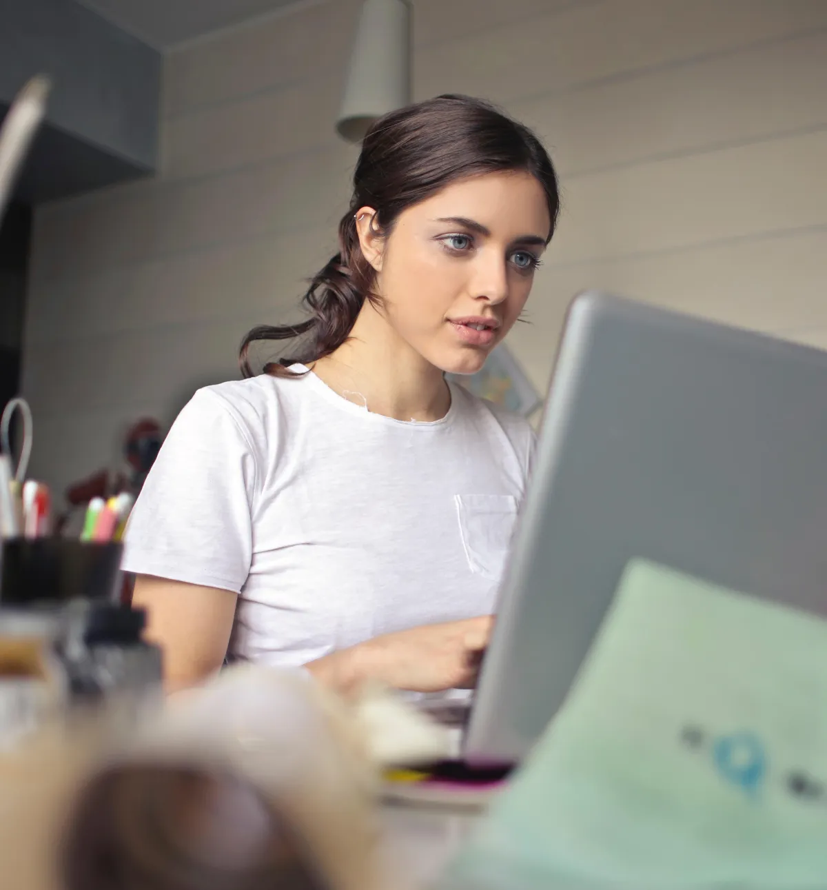 woman sitting at computer