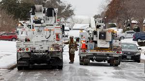 line trucks in storm