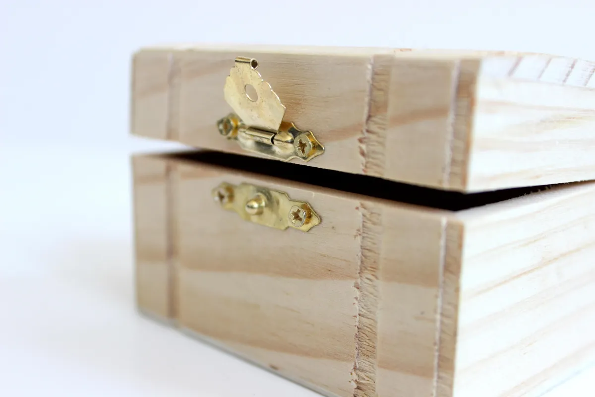 wooden with brass lock partially opened