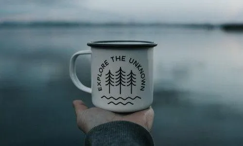 mug that says explore the unknown