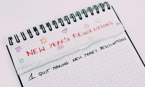 pad that say New Years Resolutions 1. Quit making resolutions 