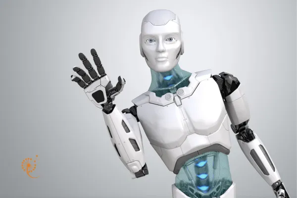 a robot is waving its hand in front of a gray background
