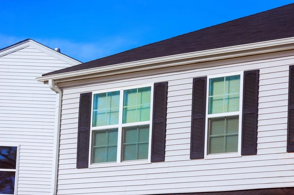 What Are the Early Signs of Siding Damage Before They Spread