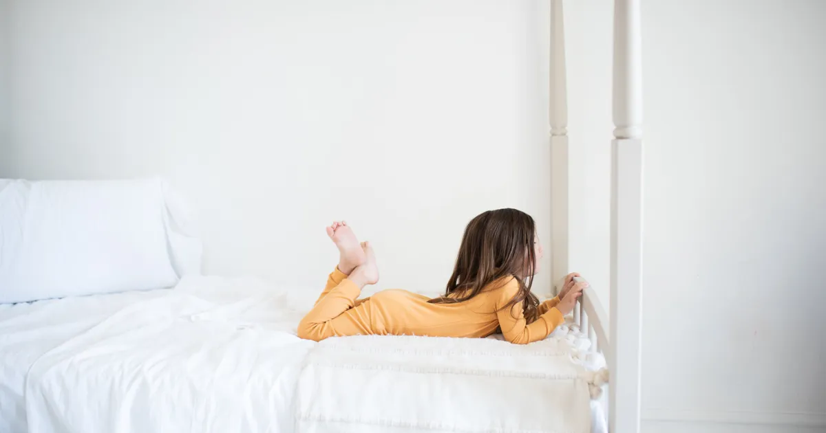 child playing in yellow