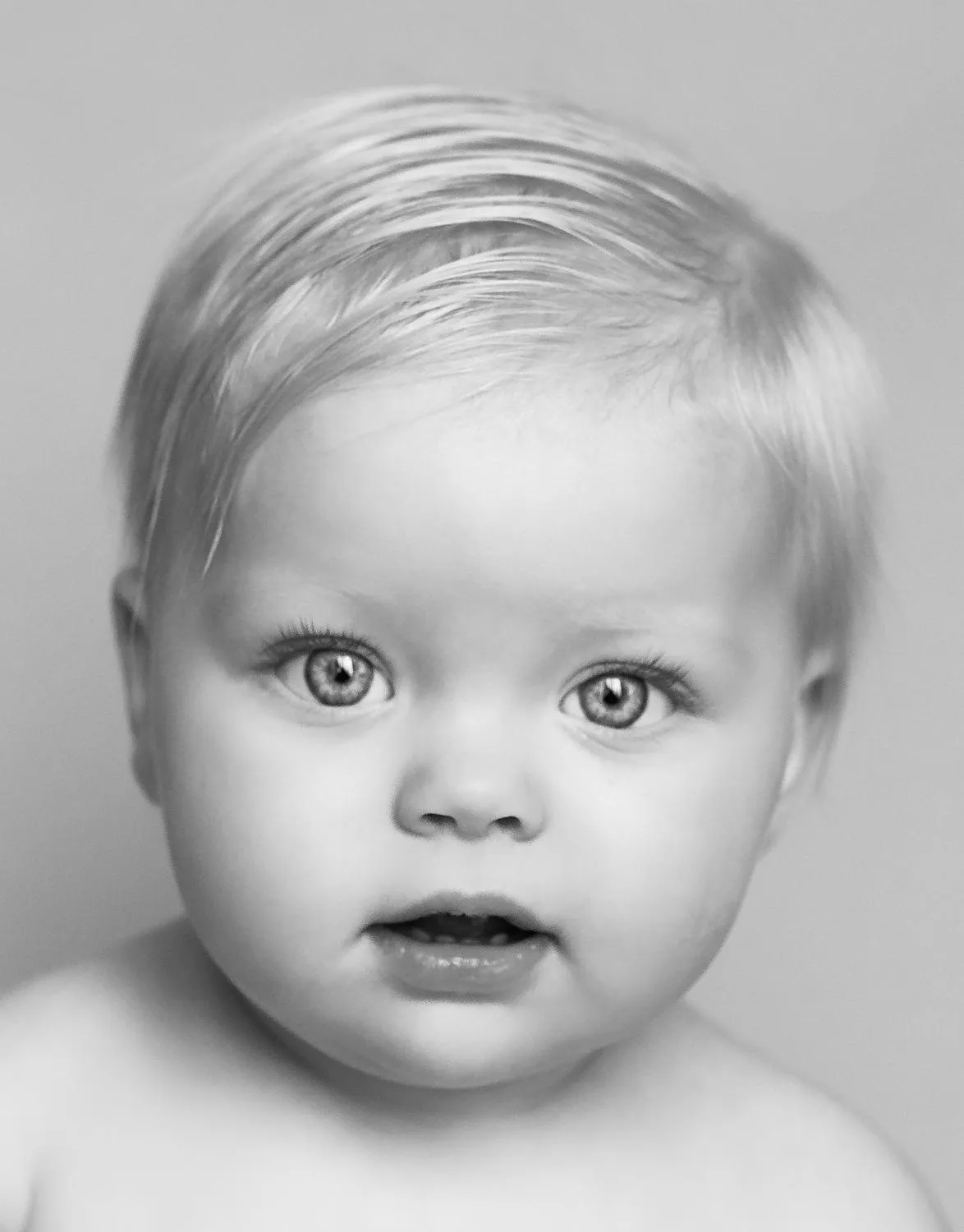 sitter looking sweetly at the camera