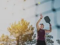 woman playing pickleball