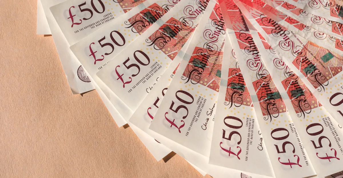 Reinvest or Hold Cash?
