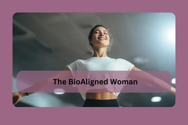 Woman standing confidently with arms open, representing alignment between health, energy, and wellbeing