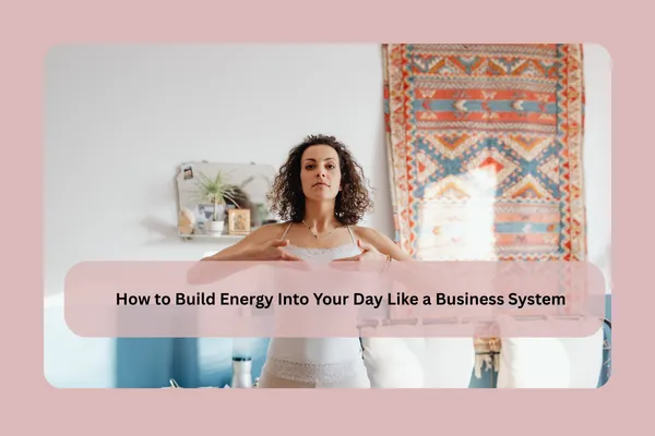 Woman practicing deep breathing in a calm home workspace, representing building daily energy through intentional routines and nervous system support.
