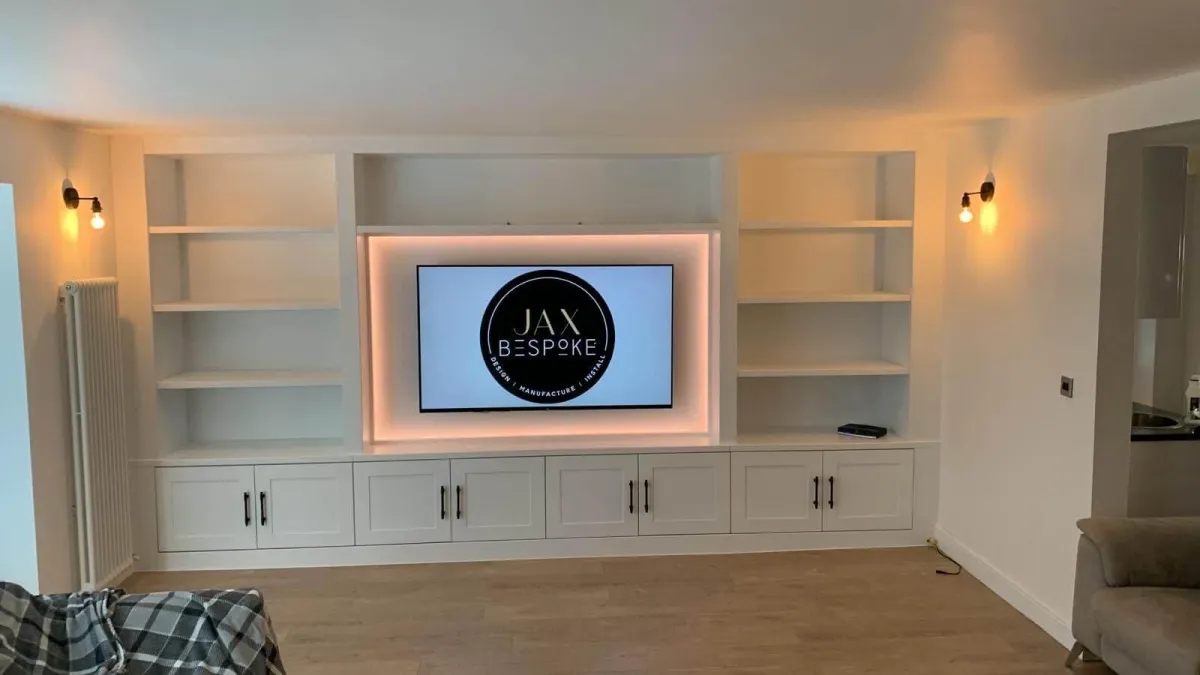 Media wall with shelves and cupboards