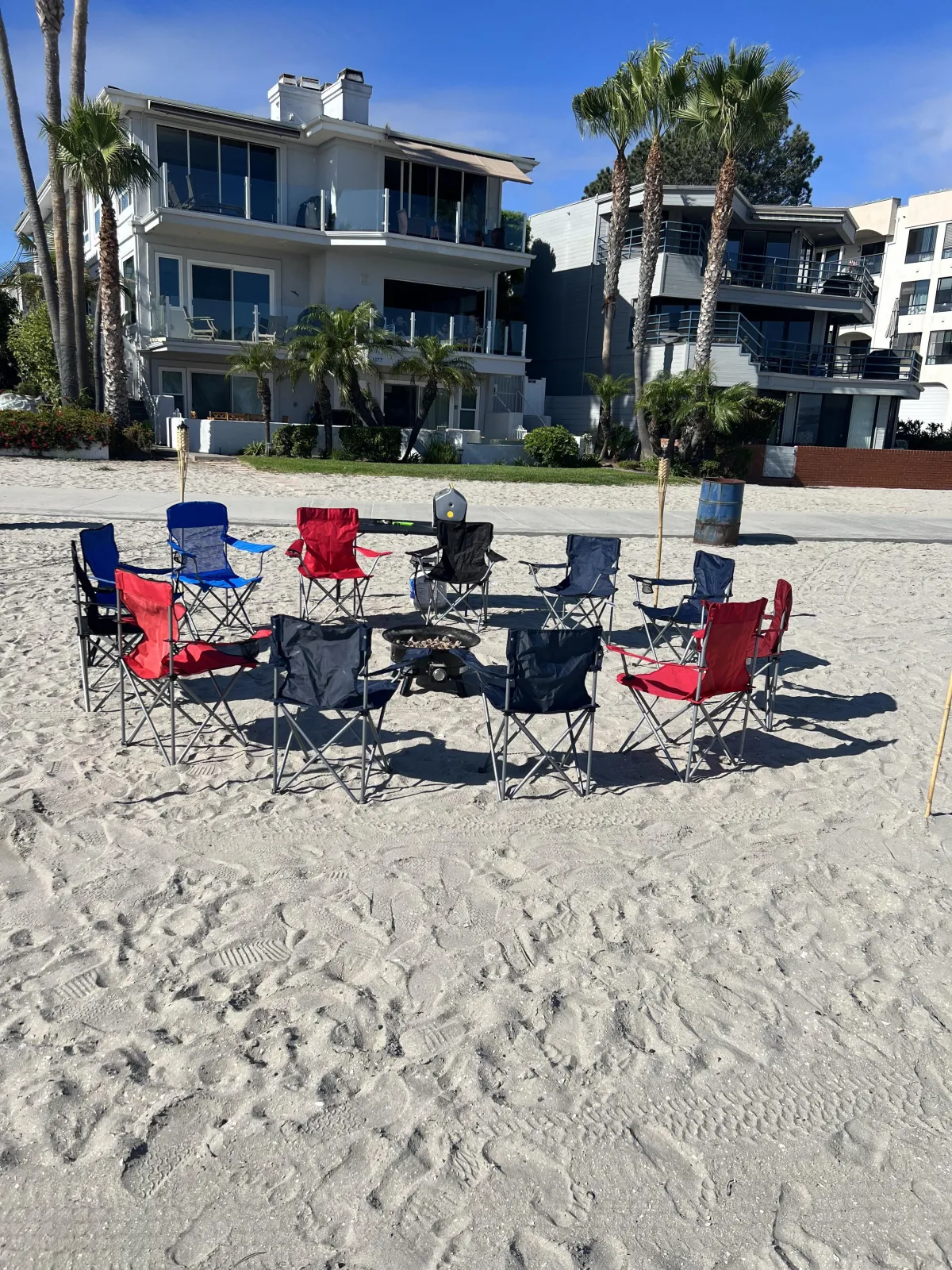 San Diego bayside bonfire rental with propane firepit, tiki torches, and tables.