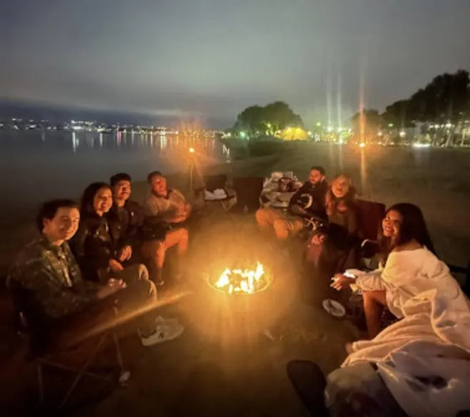 A Fun group enjoying a San Diego Bay Bonfire