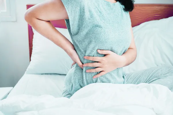 woman in pain and inflammation torso back