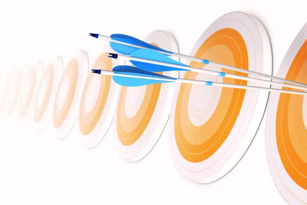 dartboard and blue darts