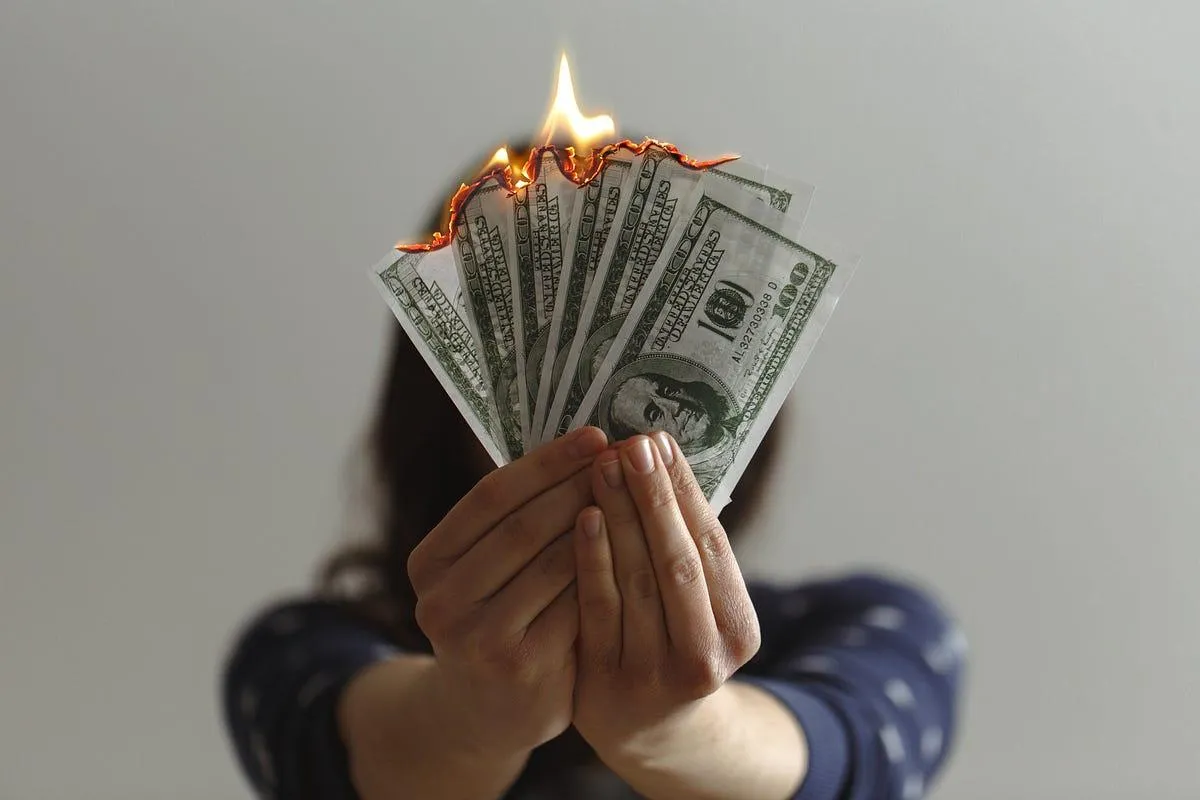 money being burned