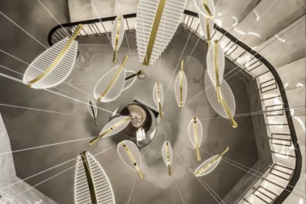 feathers-falling-down-spiral-stairs