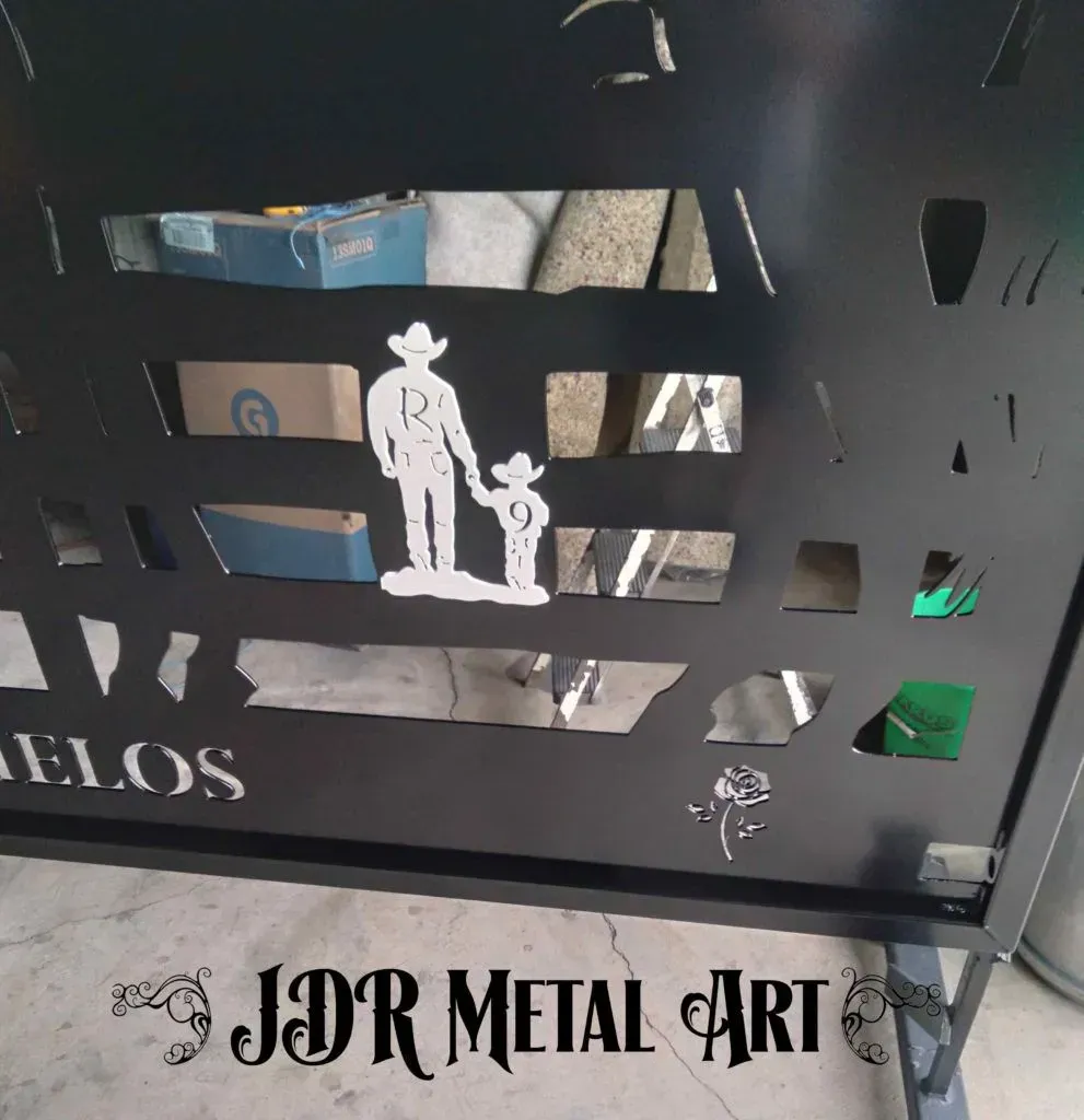 Ranch style gate with cowboy designs