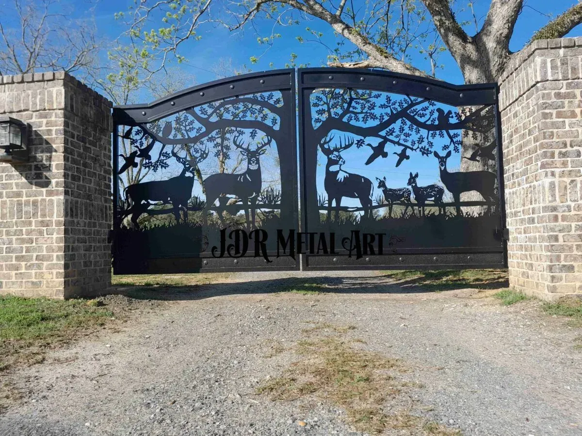 Driveway gate with deer and oak tree