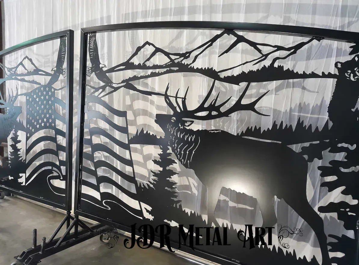 Elk themed entry gates with bear and eagle