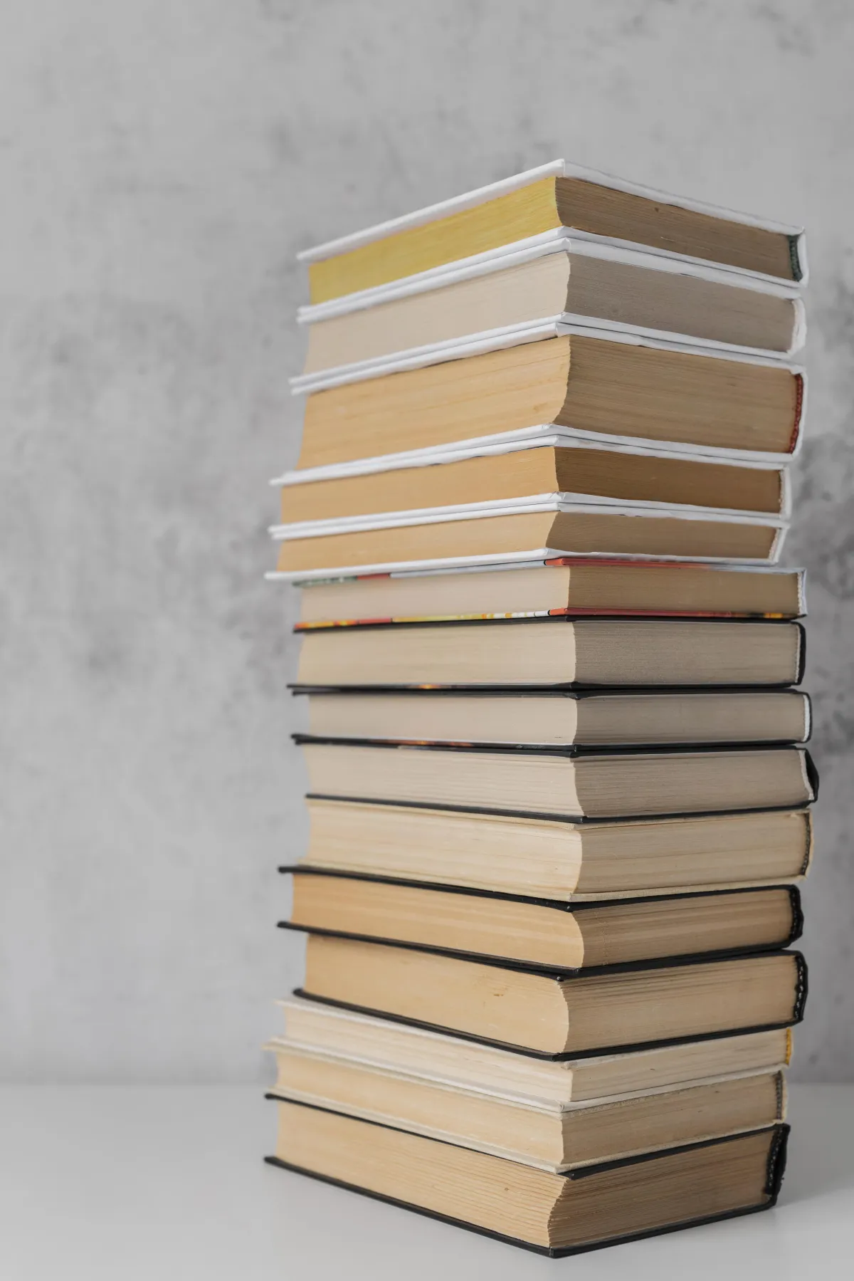 stacks of many books one on top of the other