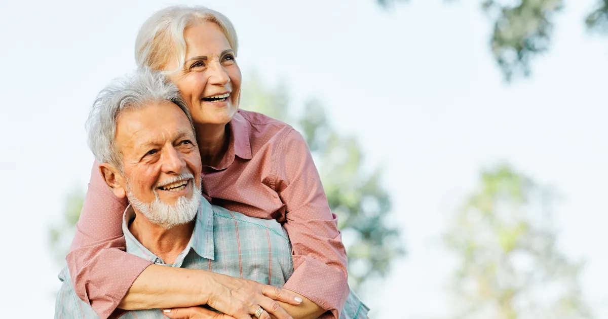 Senior couple retirement enjoying life embracing happy tax free retirement